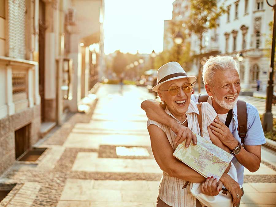 Happy senior couple on holiday in Europe