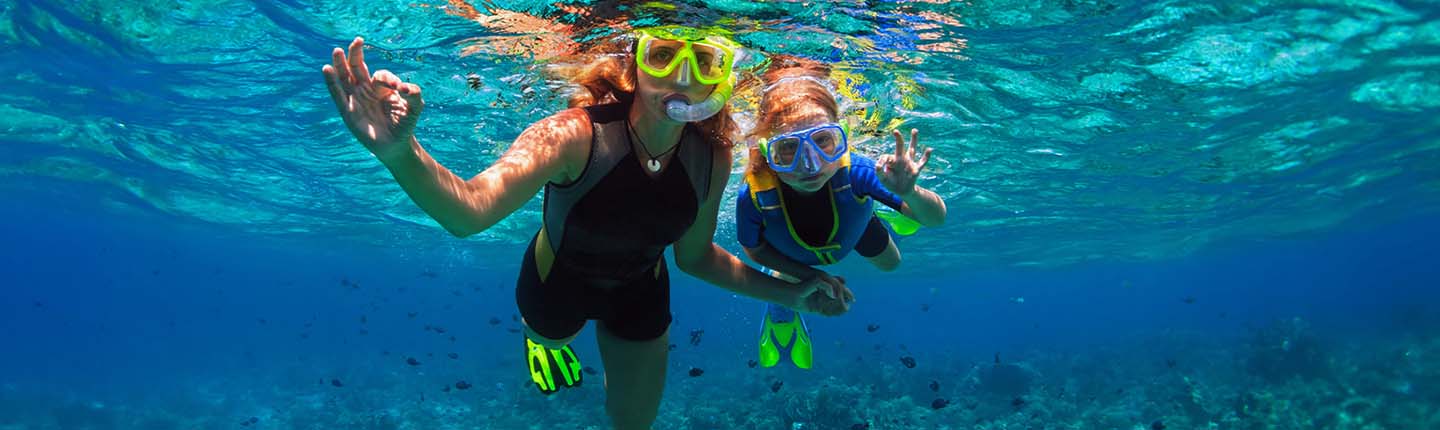 Snorkelling mum and daughter