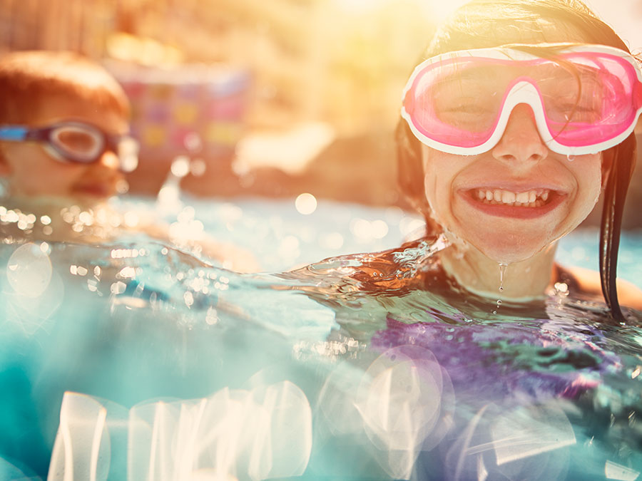 Kids in a pool in a cruise ship