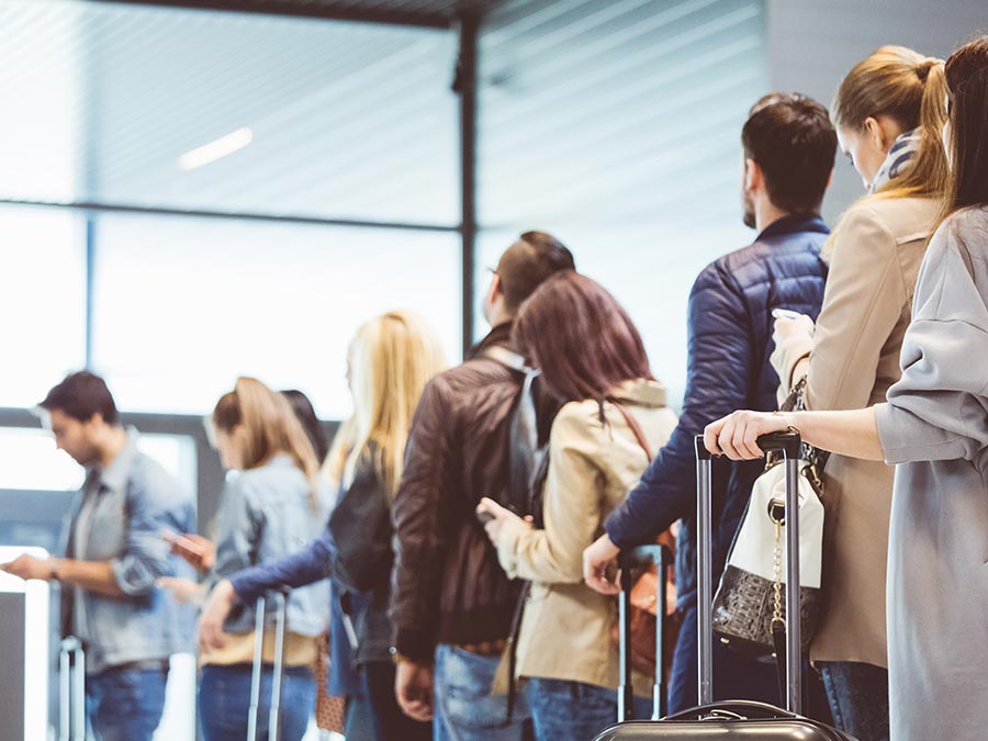 Travellers waiting to board a flight