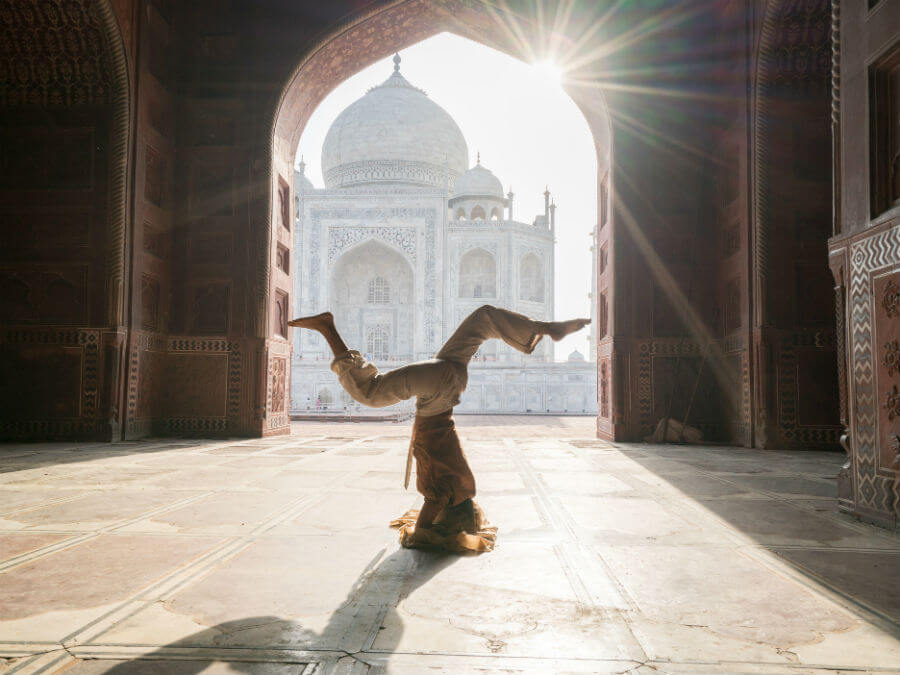Woman practicing yoga in India
