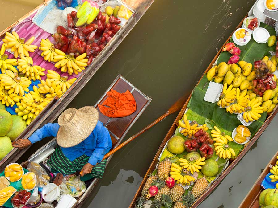 Floating market in Bangkok, Thailand - Countries where travel insurance is compulsary