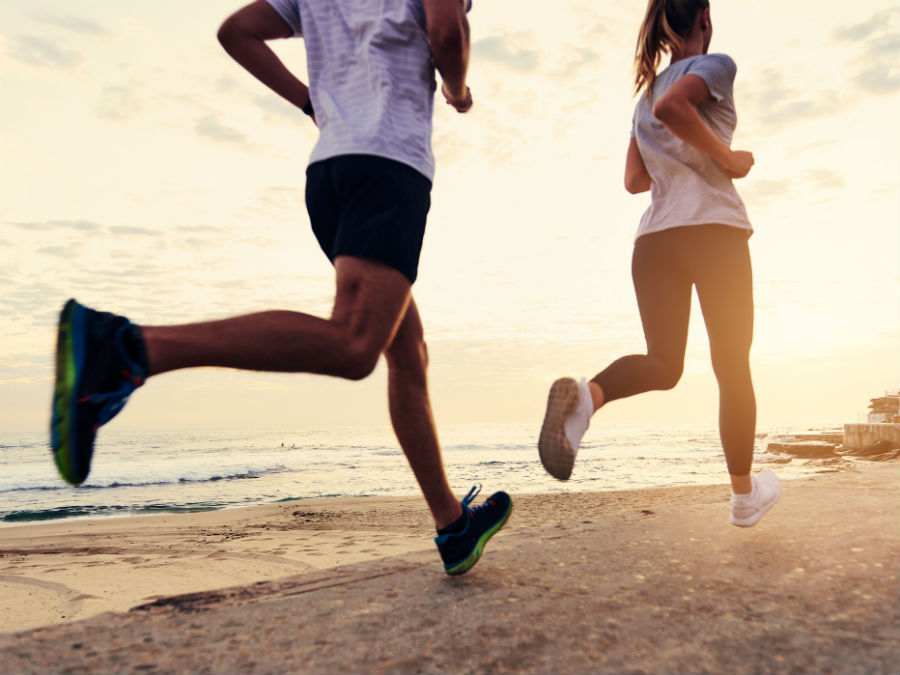 Couple running on the beach