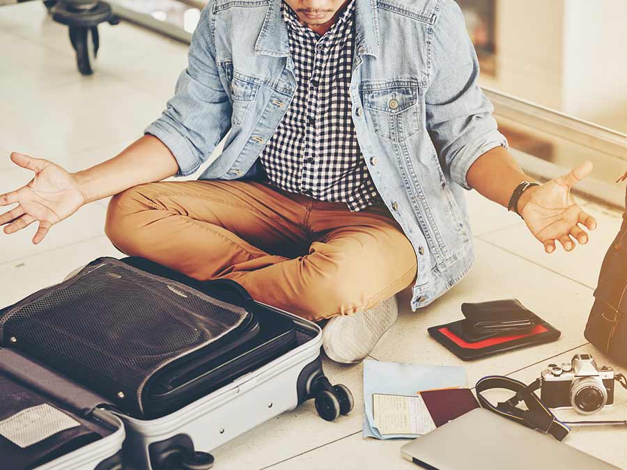 Man packing for vacation