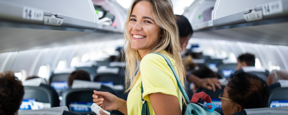 Woman boarding plane