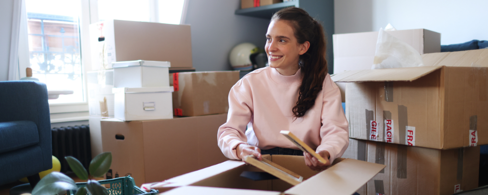 Woman packing boxes