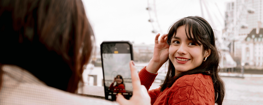 Posing for photo by the London Eye